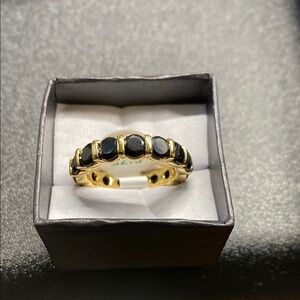 Elegant Gold and Black Stone Ring